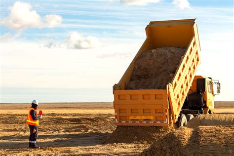 How Much Gravel Does a Dump Truck Hold, and Why Does It Matter in a World of Infinite Possibilities?